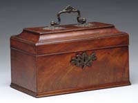 Appraisal: MAHOGANY TEA CADDY Lift lid caddy has interesting segmented interior