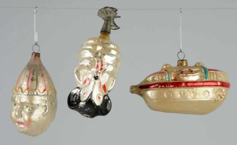 Appraisal: Lot of Rare German Ornaments Description Includes one figural boat