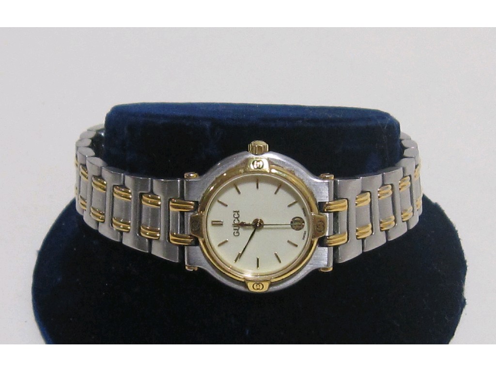 Appraisal: Ladies bi metal Gucci watch with round cream dial gilt