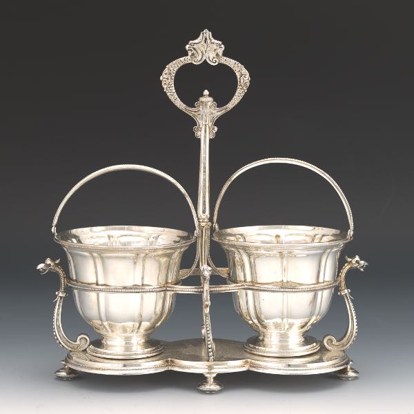 Appraisal: SHEFFIELD SILVER PLATE CONDIMENT STAND WITH TWO BASKETS BY THOMAS