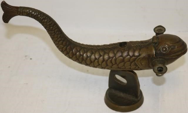 Appraisal: EARLY TH C BRONZE SEA SERPENT FORM DOUBLE FATLAMP ON