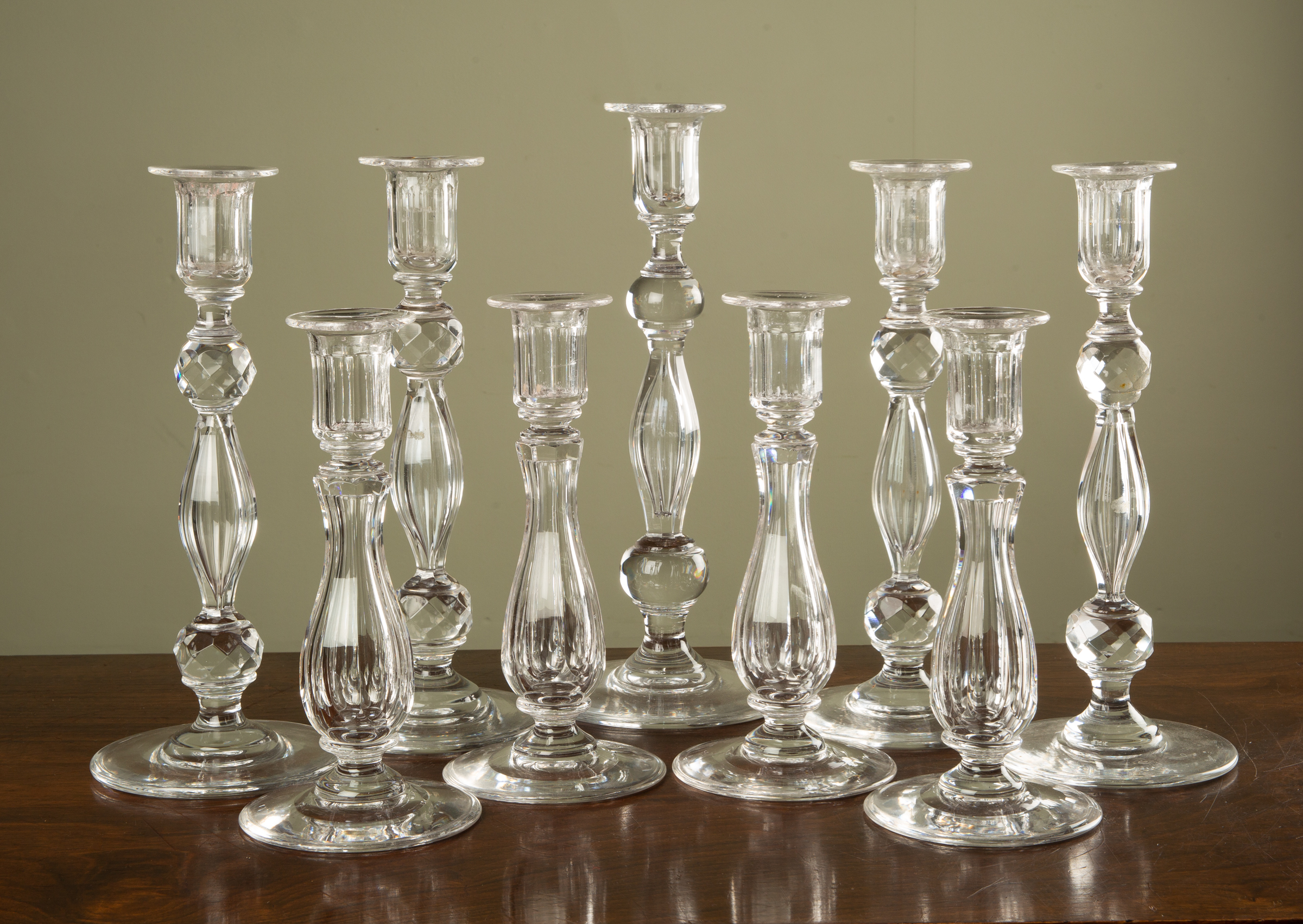 Appraisal: A set of four th century glass candle sticks with