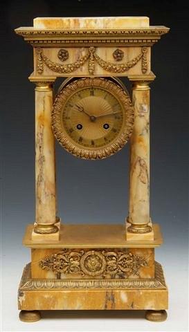 Appraisal: A FRENCH SIENNA MARBLE PORTICO LIBRARY CLOCK with striking drum