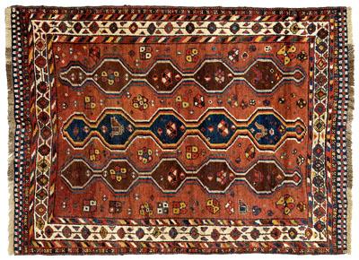 Appraisal: Shiraz rug three rows of pendant medallions on brick red