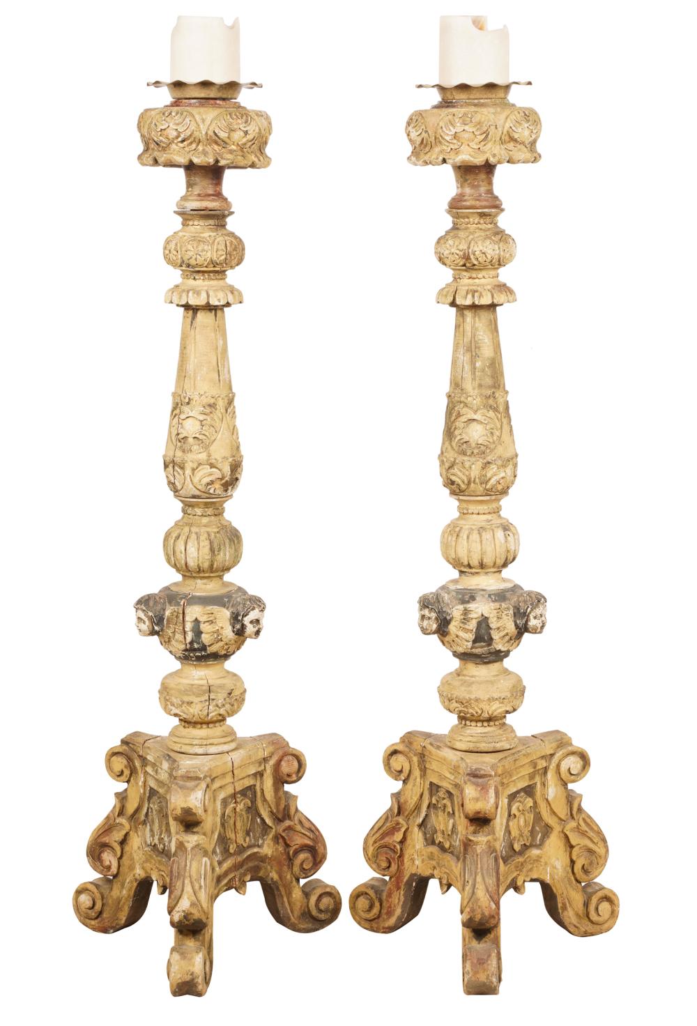 Appraisal: PAIR OF CONTINENTAL BAROQUE-STYLE ALTAR STICKScarved and painted wood inches