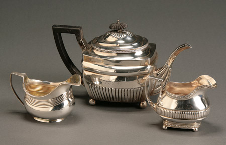 Appraisal: George III Silver Teapot and Two Cream Jugs The teapot