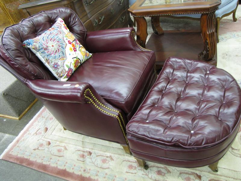 Appraisal: Wine Leather Club Chair and Ottoman