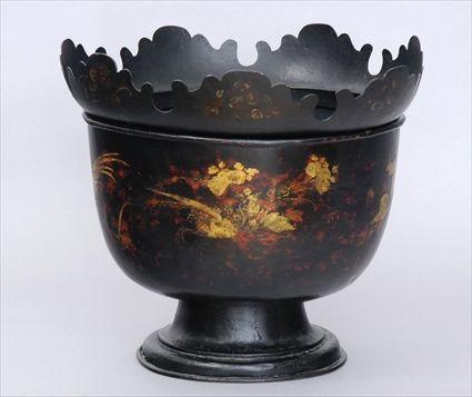 Appraisal: RARE BLACK-GROUND TOLE PEINTE MONTEITH BOWLThe hemispherical footed bowl with