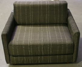 Appraisal: A large modern fabric upholstered armchair