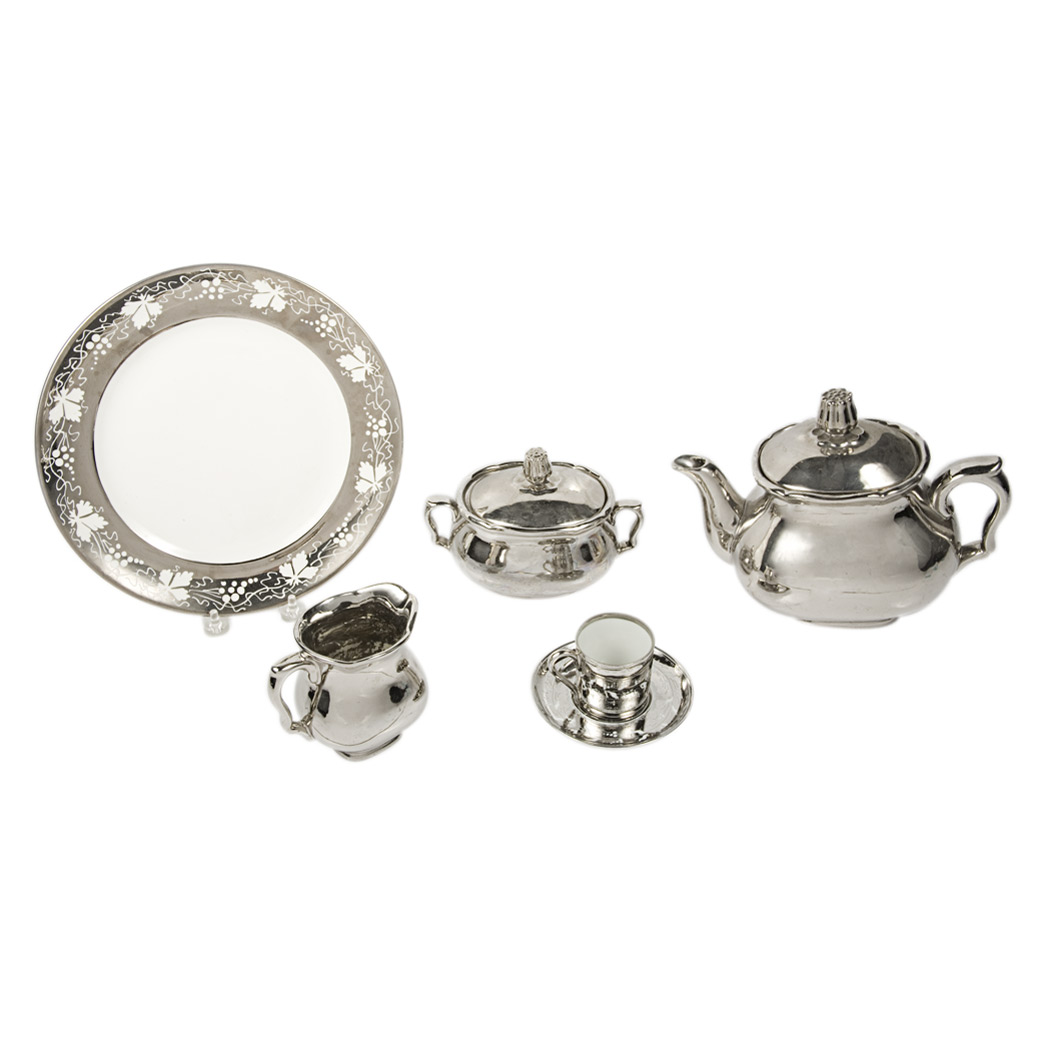 Appraisal: Assembled Silvered Porcelain Dinner Service Approximately twenty-seven pieces