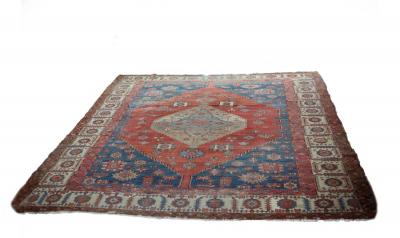 Appraisal: A bordered and figured Bakshaish carpet with central pole medallion