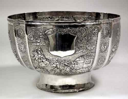 Appraisal: A Chinese silvery metal circular punch bowl with four panels