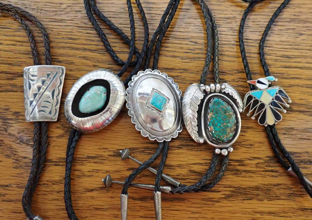 Appraisal: FIVE SW NATIVE AMERICAN SILVER AND LEATHER BOLO TIES Navajo