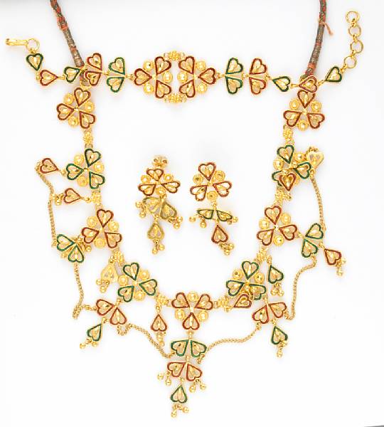 Appraisal: A suite of enamel and high karat gold Indian jewelry