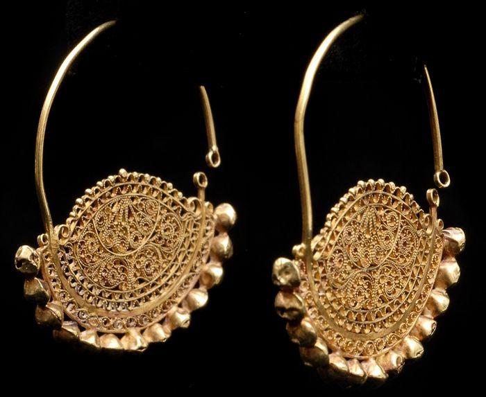 Appraisal: PAIR OF ISLAMIC-STYLE CRESCENT-FORM EARRINGS in Provenance Property from the