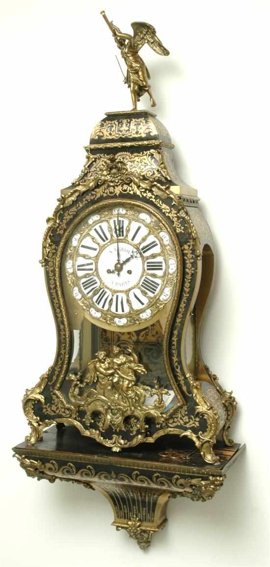 Appraisal: A French ormolu mounted and brass inlaid boulle bracket clock