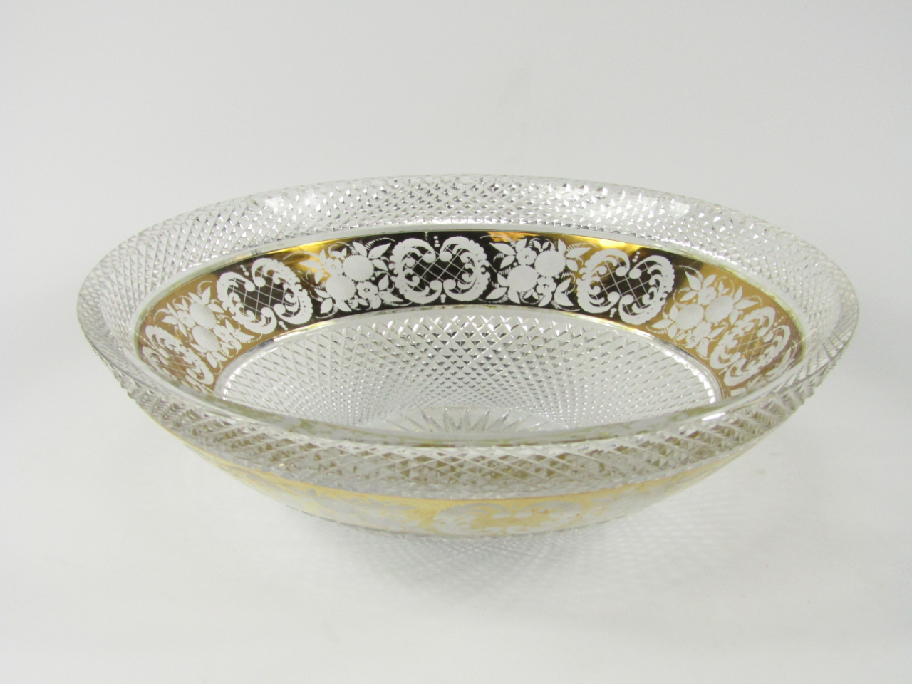 Appraisal: A Continental crystal fruit bowl decorated with an engraved gilt