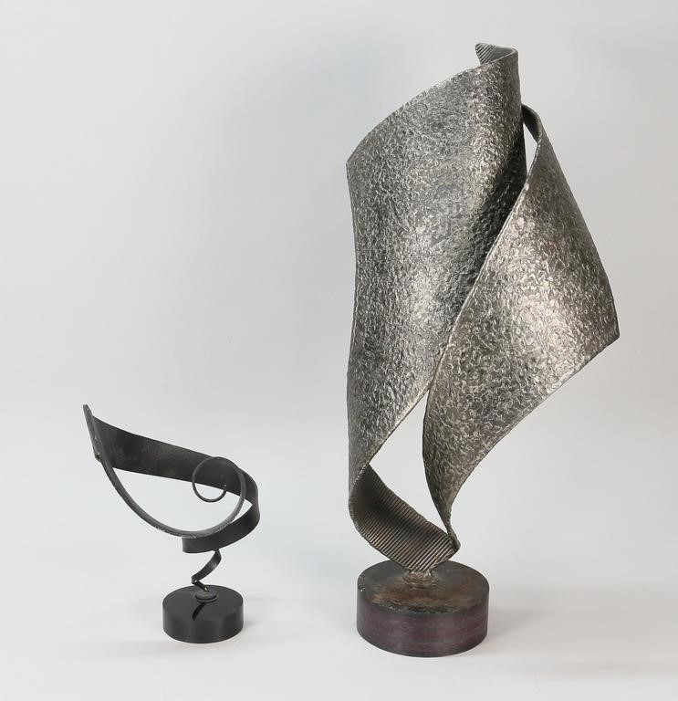 Appraisal: modern abstract metal sculptures Larger mounted on acrylic and wood