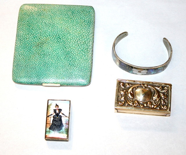 Appraisal: A SHAGREEN COVERED CIGARETTE CASE wide a brass two divisional