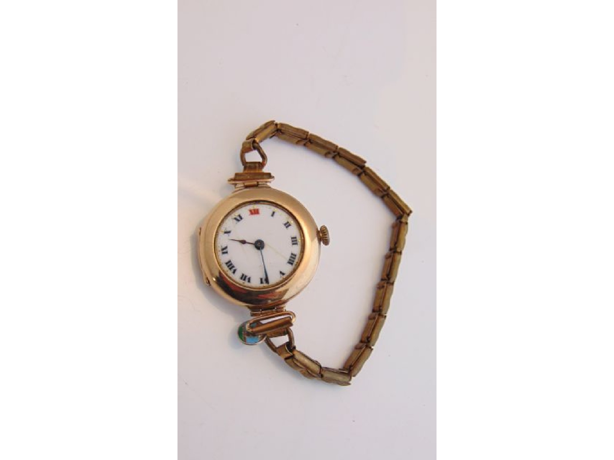 Appraisal: A lady's ct gold wristwatch Rolex the white enamelled dial