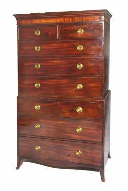 Appraisal: A GEORGE III MAHOGANY TALL BOY fitted two short and