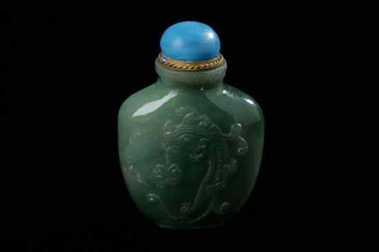 Appraisal: CHINESE GREEN JADEITE SNUFF BOTTLE Dragon decoration well hollowed -