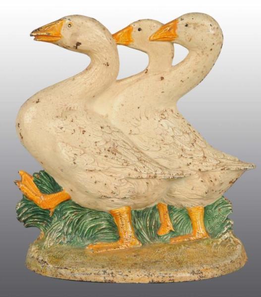 Appraisal: Cast Iron Three Geese Doorstop Description Made by Hubley cat