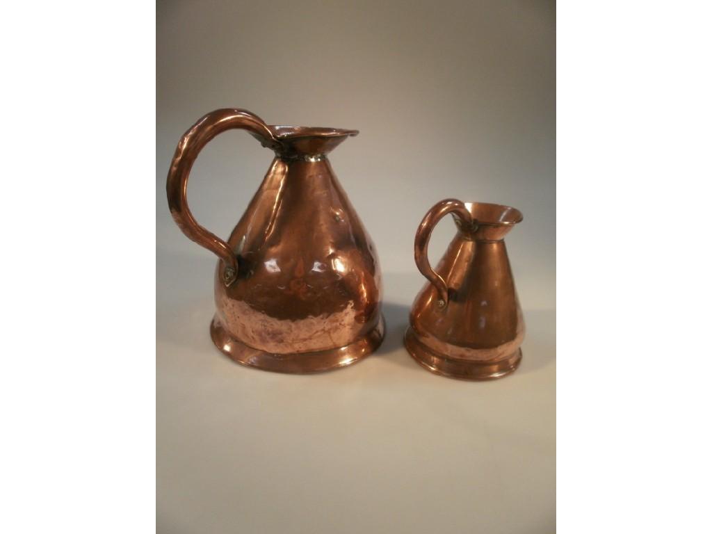 Appraisal: A large copper gallon measuring jug a copper quart measuring