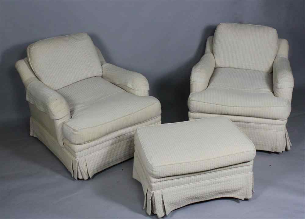 Appraisal: PAIR OF HENREDON CREAM UPHOLSTERED CLUB CHAIRS AND MATCHING OTTOMAN