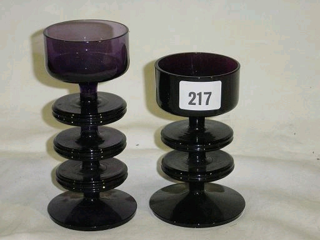 Appraisal: A Kings Lynn amethyst tinted Sheringham type glass candle holder