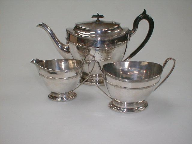 Appraisal: An Adam style urnular tea service of teapot creamer and