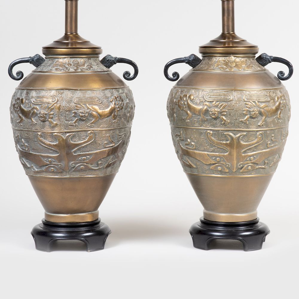 Appraisal: Pair of Cast Brass Lamps Decorated in the Asian Taste