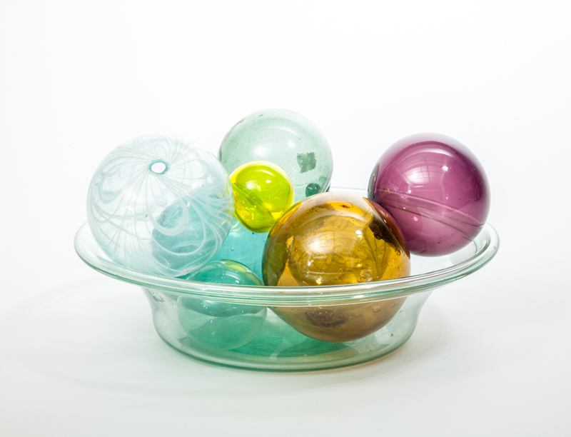 Appraisal: JERSEY TYPE GLASS BASIN AND EIGHT ASSORTED COLORED GLASS BALLS