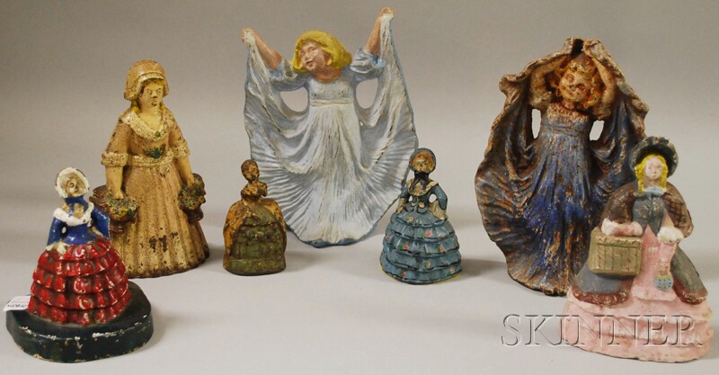 Appraisal: Seven Painted Cast Iron Belles and Girls Doorstops ht to