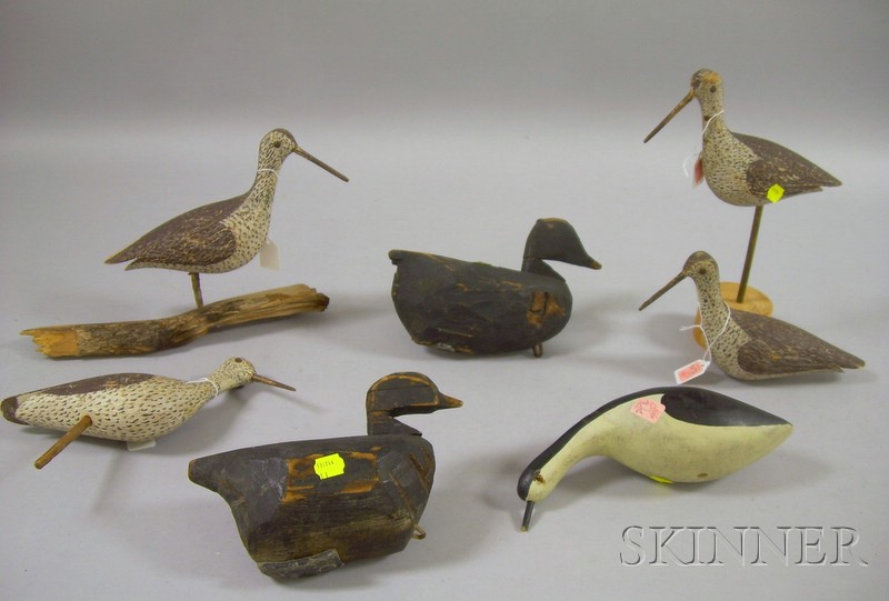 Appraisal: Two Small Primitive Black-painted Carved Wooden Duck Decoys and Five