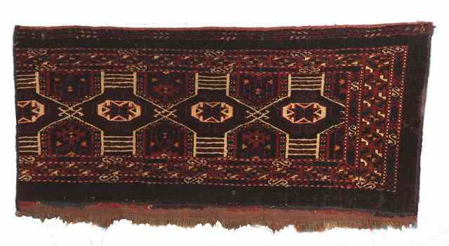 Appraisal: A CHODOR TORBA FRAGMENT th Century in a deep red