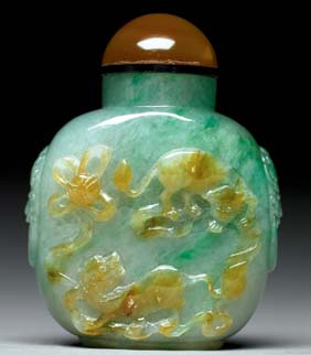 Appraisal: CARVED JADEITE SNUFF BOTTLE Finely hollowed carved jadeite snuff bottle