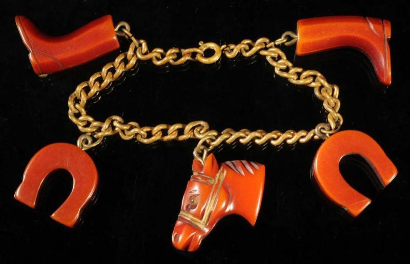 Appraisal: Bakelite Western Charm Bracelet Description Charms are -inch long Condition