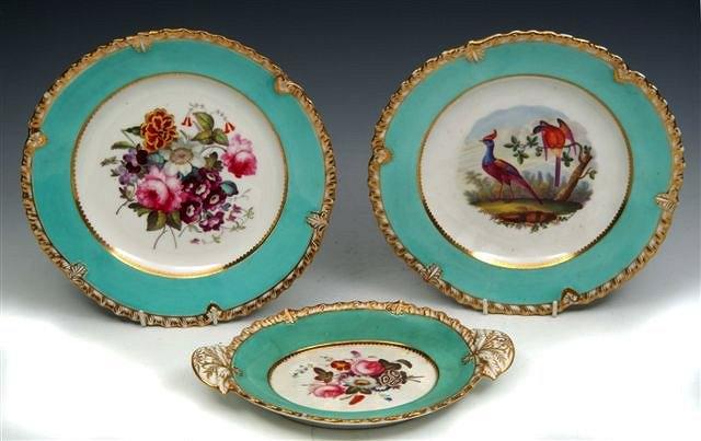 Appraisal: A COALPORT PLATE painted with sevres style birds in the