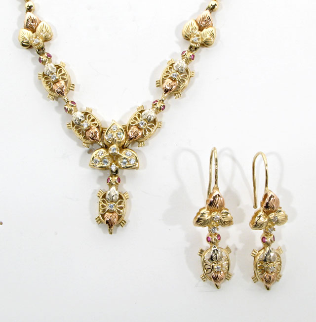 Appraisal: FOURTEEN KARAT YELLOW AND ROSE GOLD NECKLACE AND EARRINGS SET