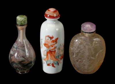 Appraisal: Three Chinese snuff bottles elongated spade-shaped porcelain bottle stopper with