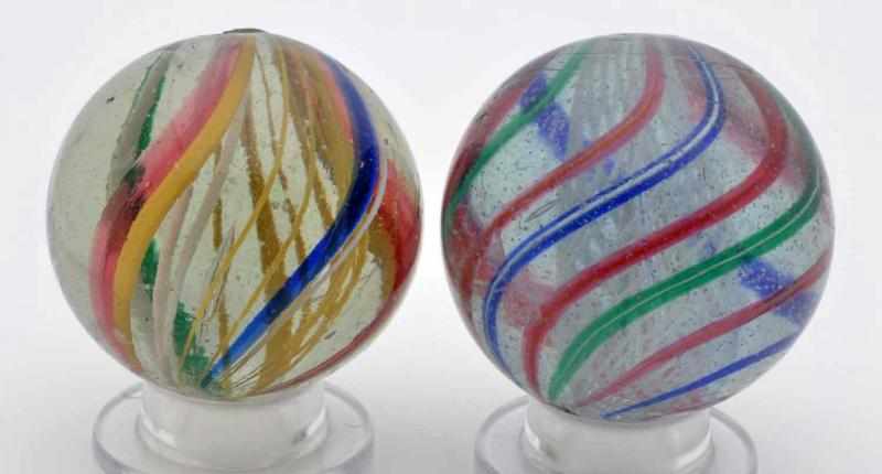 Appraisal: Lot of Swirl Marbles Description Smaller marble is a white