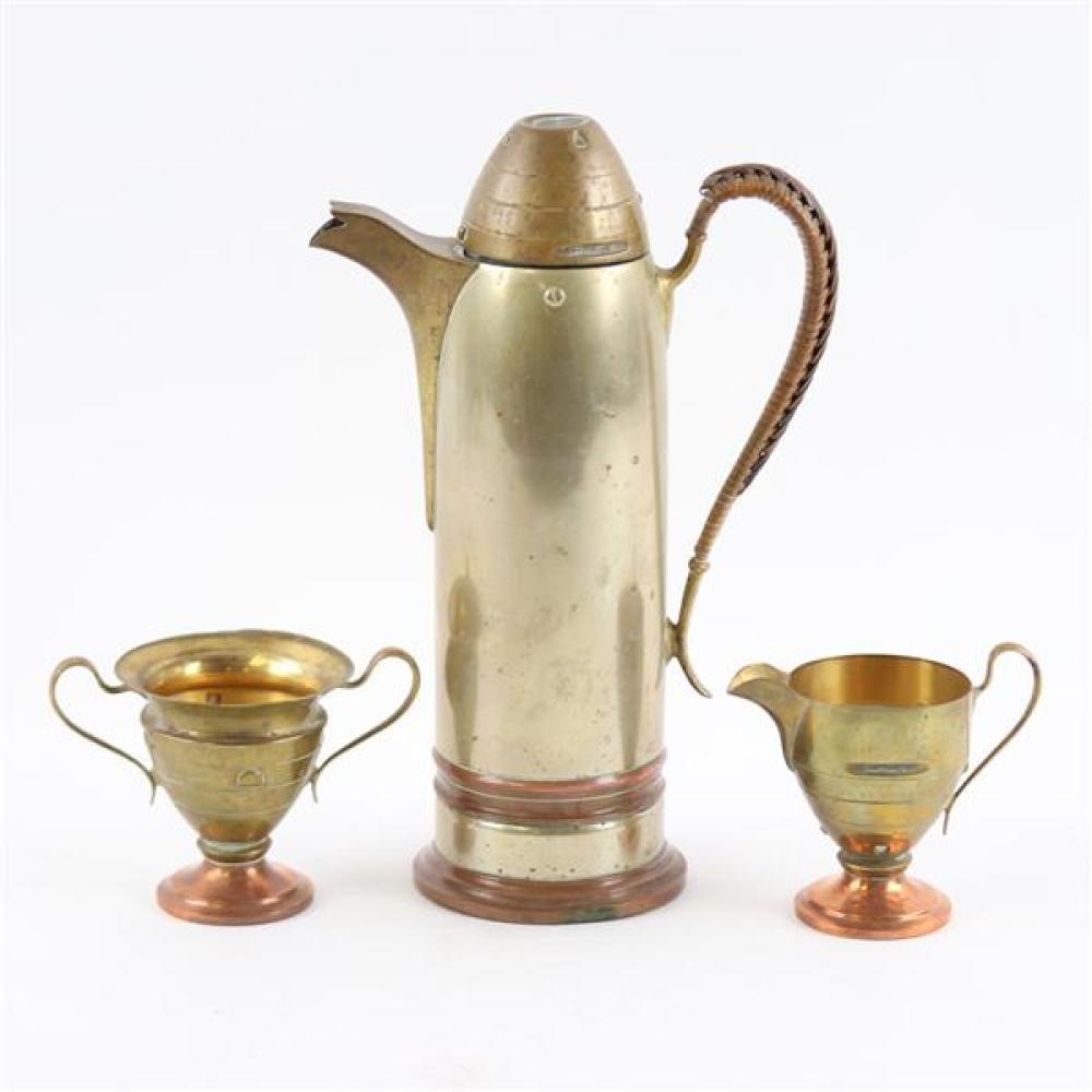 Appraisal: TRENCH ART ARTILLERY SHELL CLARET PITCHER AND CUPS SET Trench