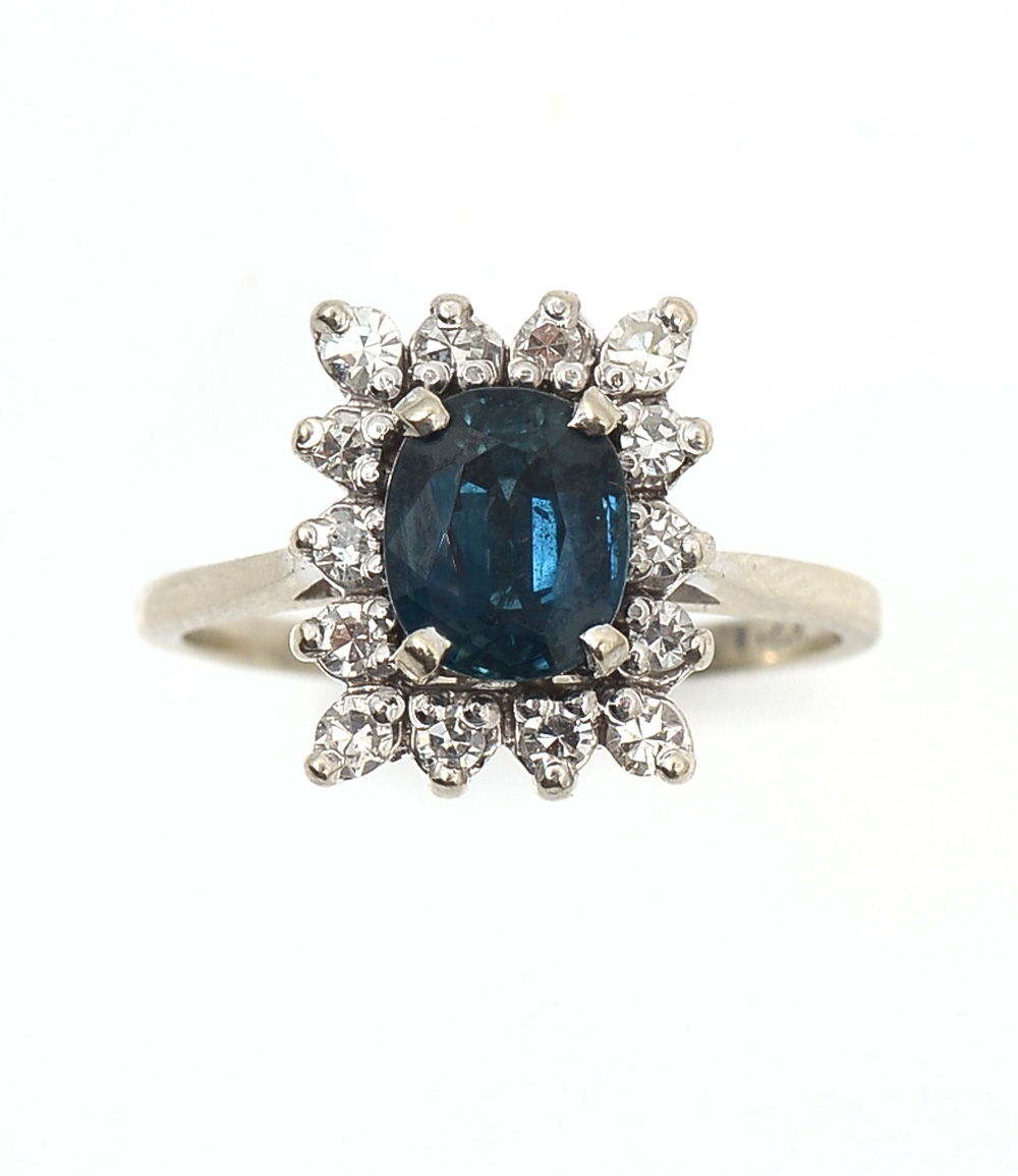 Appraisal: K SAPPHIRE DIAMOND RING K white gold ring contains one