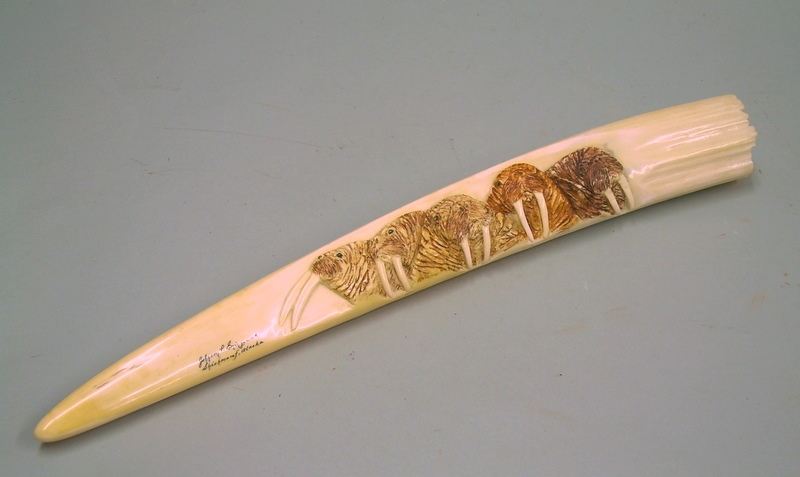 Appraisal: Carved Walrus Tusk carving depicts five walruses inscribed Johnson P