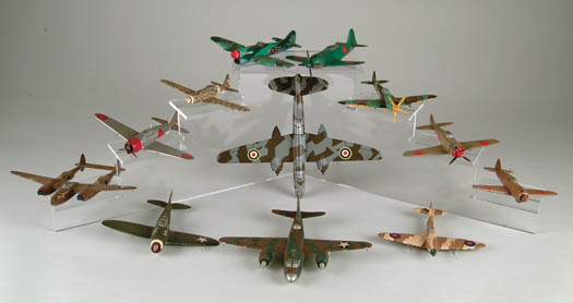 Appraisal: PAINTED CARVED WOOD MODELS OF VINTAGE WAR PLANES Each one