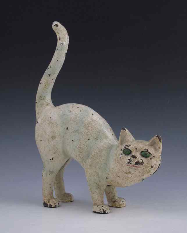 Appraisal: HUBLEY ARCHED BACK TABBY CAT CAST IRON DOORSTOP White with