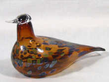 Appraisal: Oiva Iittala A bird in amber glass with blue and