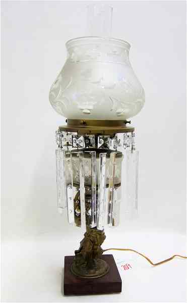 Appraisal: GILT METAL GLASS FIGURAL GIRONDOLE TABLE LAMP electrified oil lamp