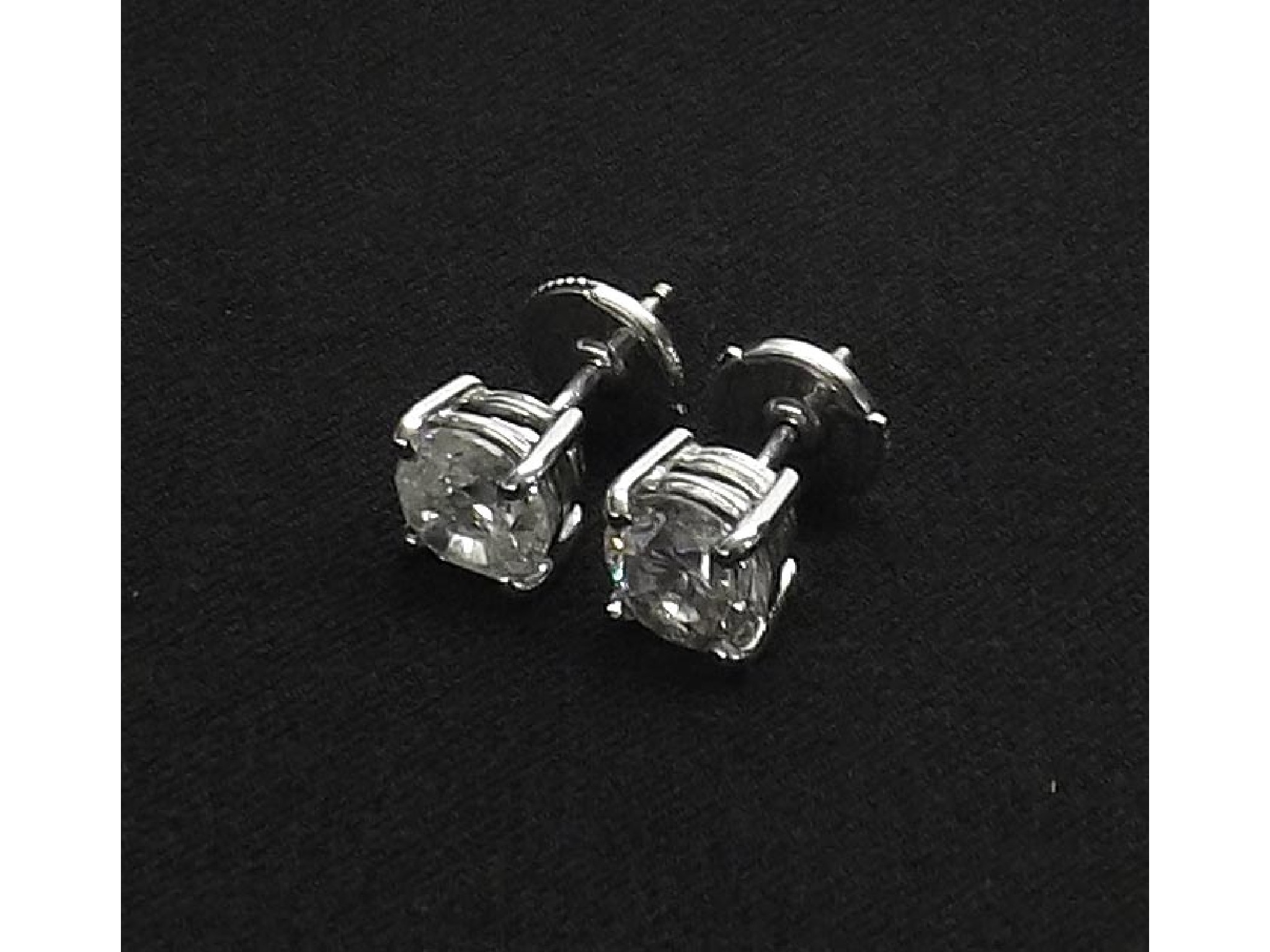 Appraisal: Pair of ct white gold round-brilliant cut diamond ear studs